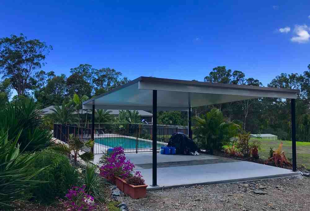 free standing patio giving shade next to the pool