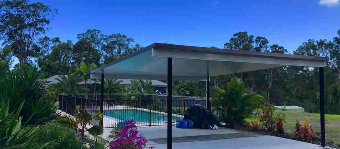 free standing patio giving shade next to the pool